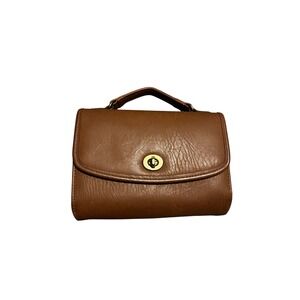 Rosetti faux leather organizer clutch